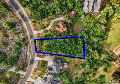 This residential lot offers 0.83 acres within the Timberwood - photo 3