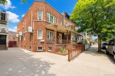 Located in Dyker Heights! Semi-attached 2-dwelling brick home on - photo 1
