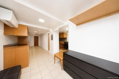 Located in Dyker Heights! Semi-attached 2-dwelling brick home on - photo 8
