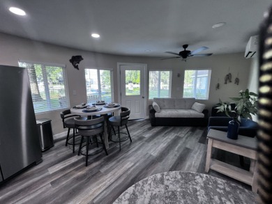 Modern Comfort Meets Lakeside Charm on Johnson Lake! - photo 7