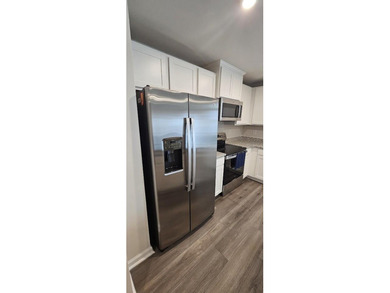 Sold Fully Furnish! Welcome to coastal living at its finest in - photo 11
