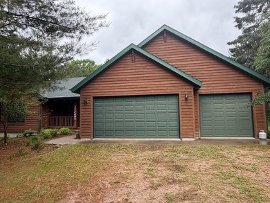 Come enjoy this Manitowish River, 3-bedroom, 3-bath year-round - photo 2