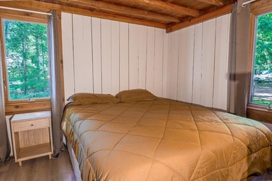 This one has a Northwoods personality with classic rustic charm - photo 7