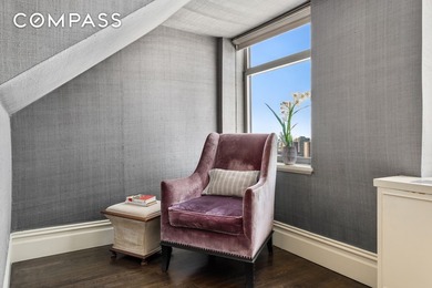 This duplex penthouse residence feels like a townhouse in the - photo 12