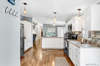 Effortless lakefront living meets income potential--welcome to