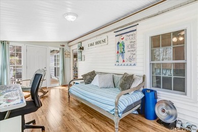 Effortless lakefront living meets income potential--welcome to