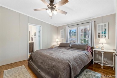 Effortless lakefront living meets income potential--welcome to