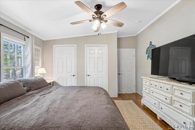 Effortless lakefront living meets income potential--welcome to