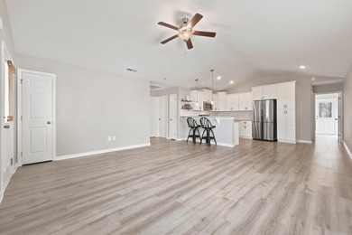 Welcome to this charming 3-bedroom, 2-bath home in the desirable - photo 2