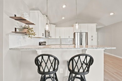 Welcome to this charming 3-bedroom, 2-bath home in the desirable - photo 4