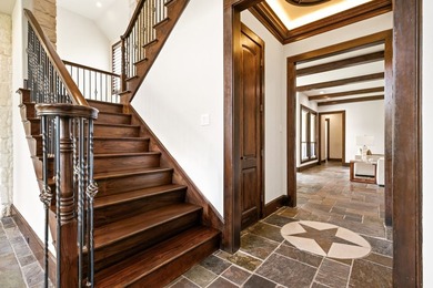 Tucked beneath the mature trees of Bent Tree North, this custom - photo 27