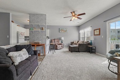 This updated second-floor, 3-bedroom, 2-bath condo overlooks the - photo 3