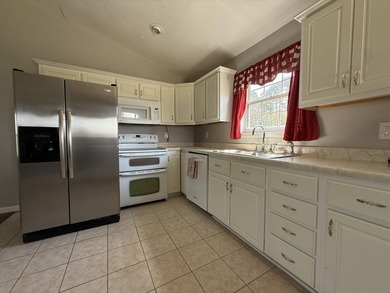 Escape to the Ozarks with this charming 3-bed, 2-bath vacation - photo 4