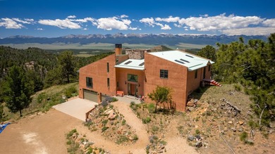 Nestled amidst a forest of aspen, pine, and fir trees, this - photo 1