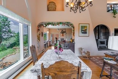 Nestled amidst a forest of aspen, pine, and fir trees, this - photo 6