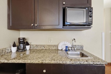 Welcome to Landmark Resort, where oceanfront living - photo 8