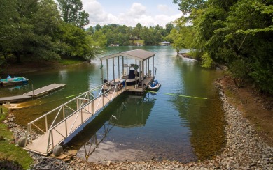 ENJOY LAKE LIVING IN THE MOUNTAINS OF NORTH CAROLINA! This 2 - Lake Home For Sale in Hayesville, North Carolina