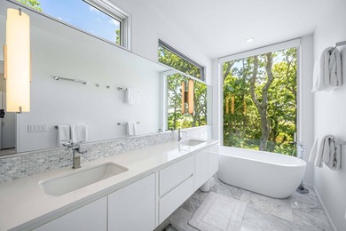 In the private Lion Head waterfront community, this chic - photo 14