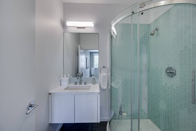 In the private Lion Head waterfront community, this chic - photo 17