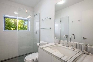In the private Lion Head waterfront community, this chic - photo 25