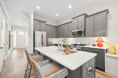 Located in the quiet, brick-paved community of Sacred Oaks. This - photo 11