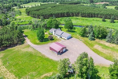 This exceptional Northwoods property offers 170+/- acres of - photo 1