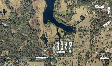 The lot is already equipped with a well, septic, and a power - photo 2