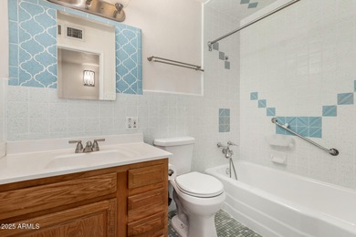 Live comfortably in this classic home where everyday ease is at