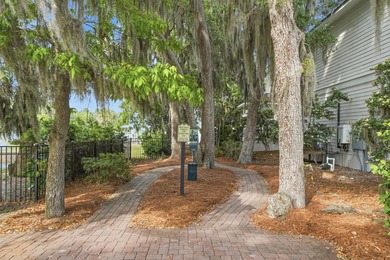Located in the quiet, brick-paved community of Sacred Oaks. This - photo 42