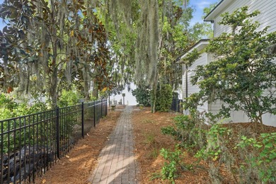 Located in the quiet, brick-paved community of Sacred Oaks. This - photo 43