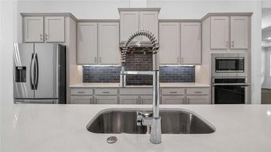 Discover refined Florida living in this stunning 2022 custom - photo 13