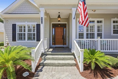 Experience luxury coastal living in the prestigious gated - photo 3