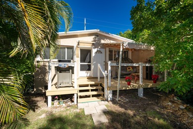 This 1,200 sq. ft. 2-bedroom, 2-bathroom home sits on a generous - photo 1