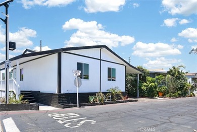 Welcome to this 4-bedroom, 2-bathroom manufactured home situated - photo 1
