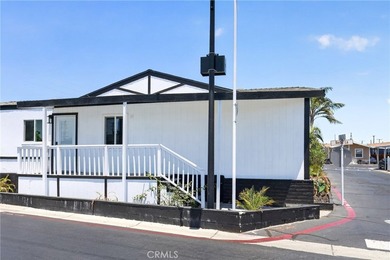 Welcome to this 4-bedroom, 2-bathroom manufactured home situated - photo 2