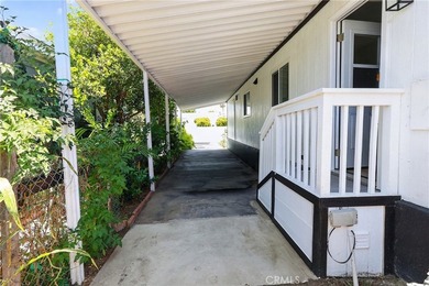Welcome to this 4-bedroom, 2-bathroom manufactured home situated - photo 8