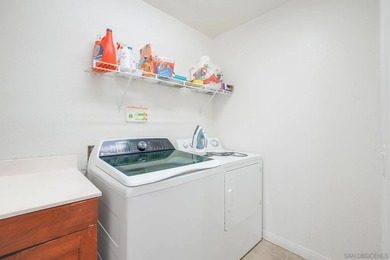 Beautifully maintained end-unit residence in the highly - photo 9