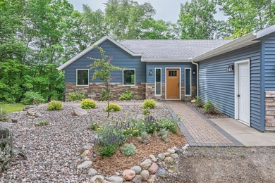 Enjoy this 3 bdrm. 3.5 bath lakefront single story home with - photo 1