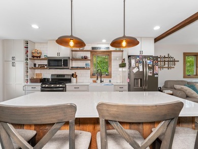Enjoy this 3 bdrm. 3.5 bath lakefront single story home with - photo 5