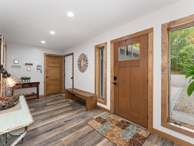 Enjoy this 3 bdrm. 3.5 bath lakefront single story home with - photo 9