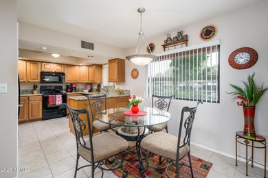 This updated, perfectly situated condo in the desirable Paradise