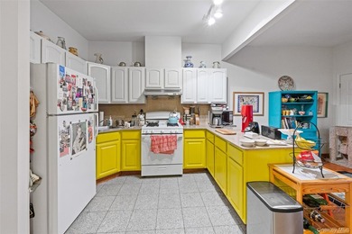 Discover this exceptional three-family property in one of - photo 18