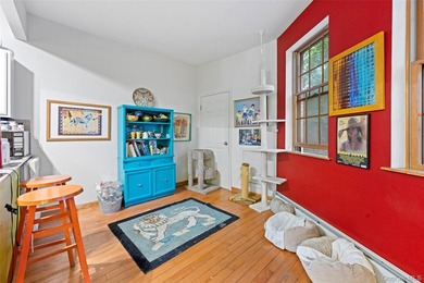 Discover this exceptional three-family property in one of - photo 19
