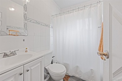 Discover this exceptional three-family property in one of - photo 20