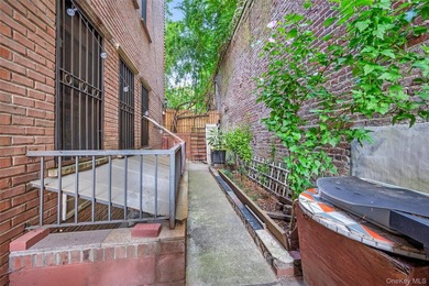 Discover this exceptional three-family property in one of - photo 23