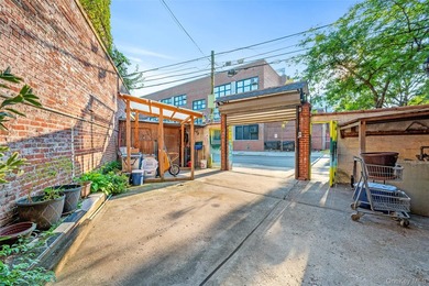 Discover this exceptional three-family property in one of - photo 24