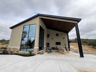 Nestled just beyond the city limits of Kerrville, this sprawling - photo 4