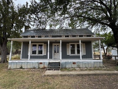 Nestled just beyond the city limits of Kerrville, this sprawling - photo 5