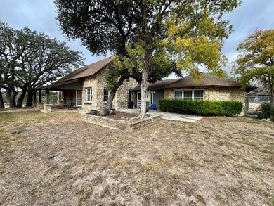 Nestled just beyond the city limits of Kerrville, this sprawling - photo 6