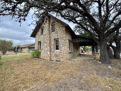 Nestled just beyond the city limits of Kerrville, this sprawling - photo 7